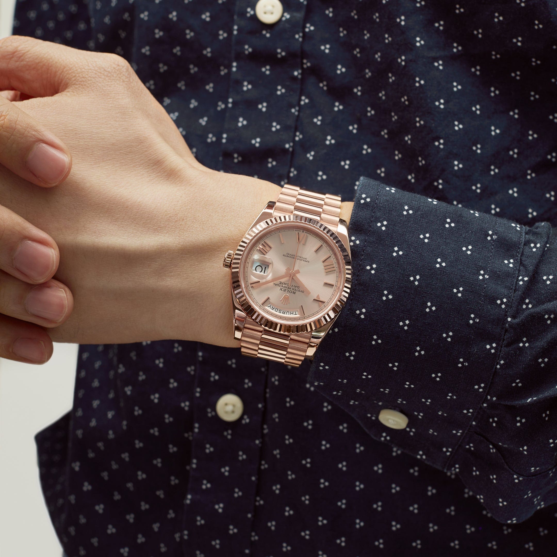 Rolex Day-Date 228235 Rose Gold Sundust Roman Dial