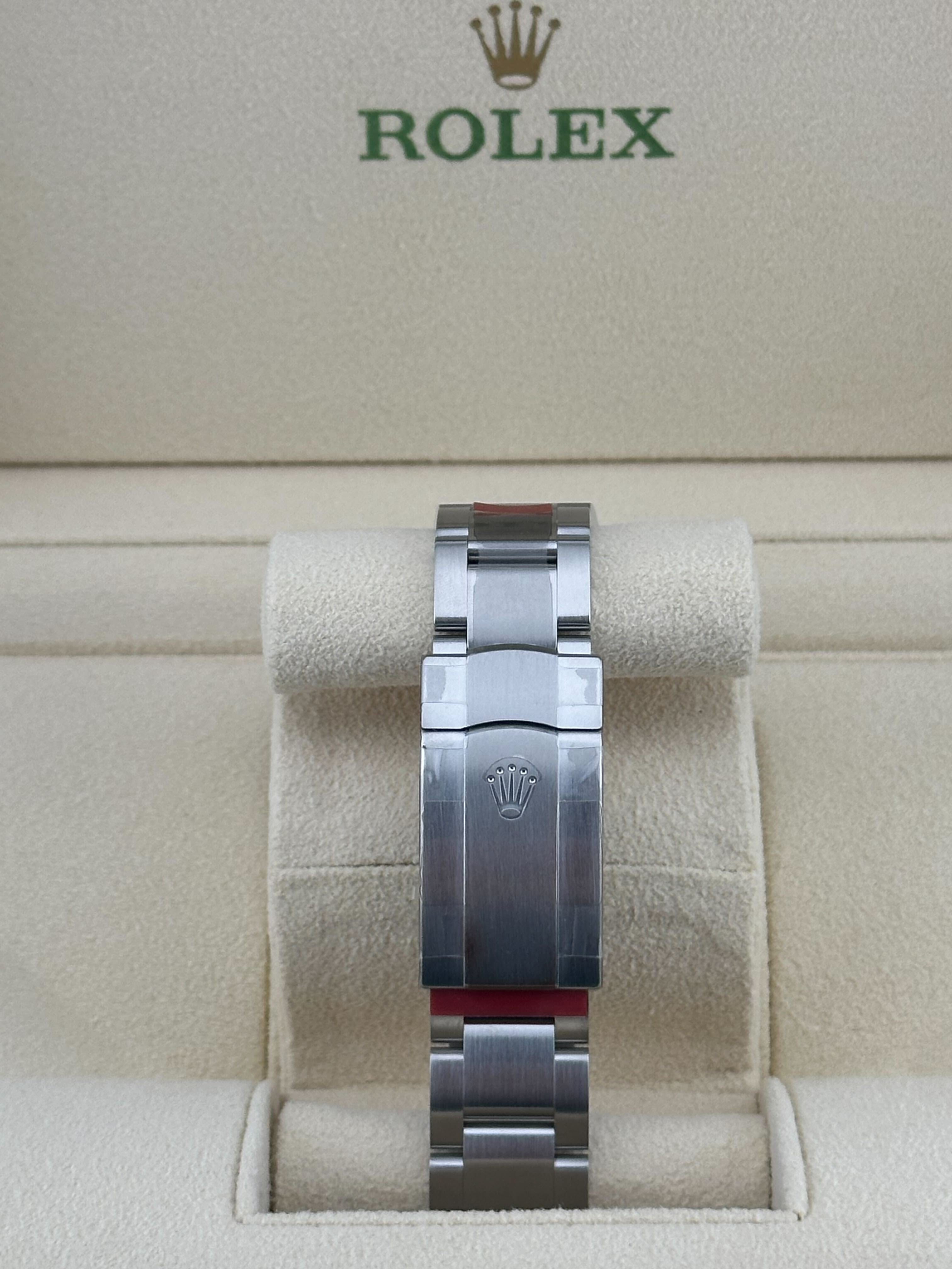 Rolex Oyster Perpetual 124300 Domed Bezel Red Dial